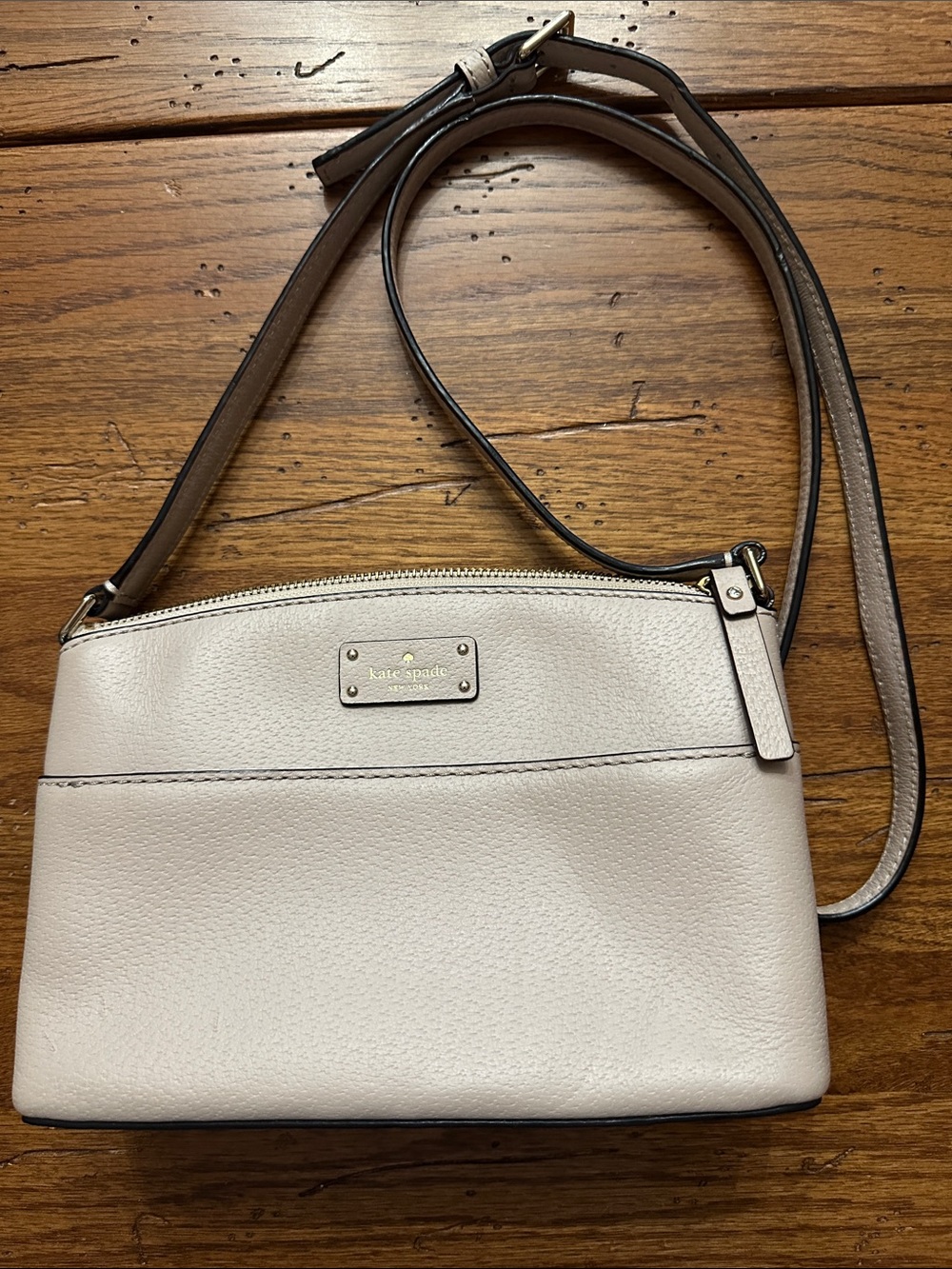 Kate Spade Pebbled Leather Crossbody-color is pale pink with gold hardware